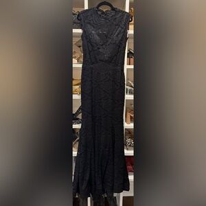 Elegant Black Lace Betsy Adam’s gown.